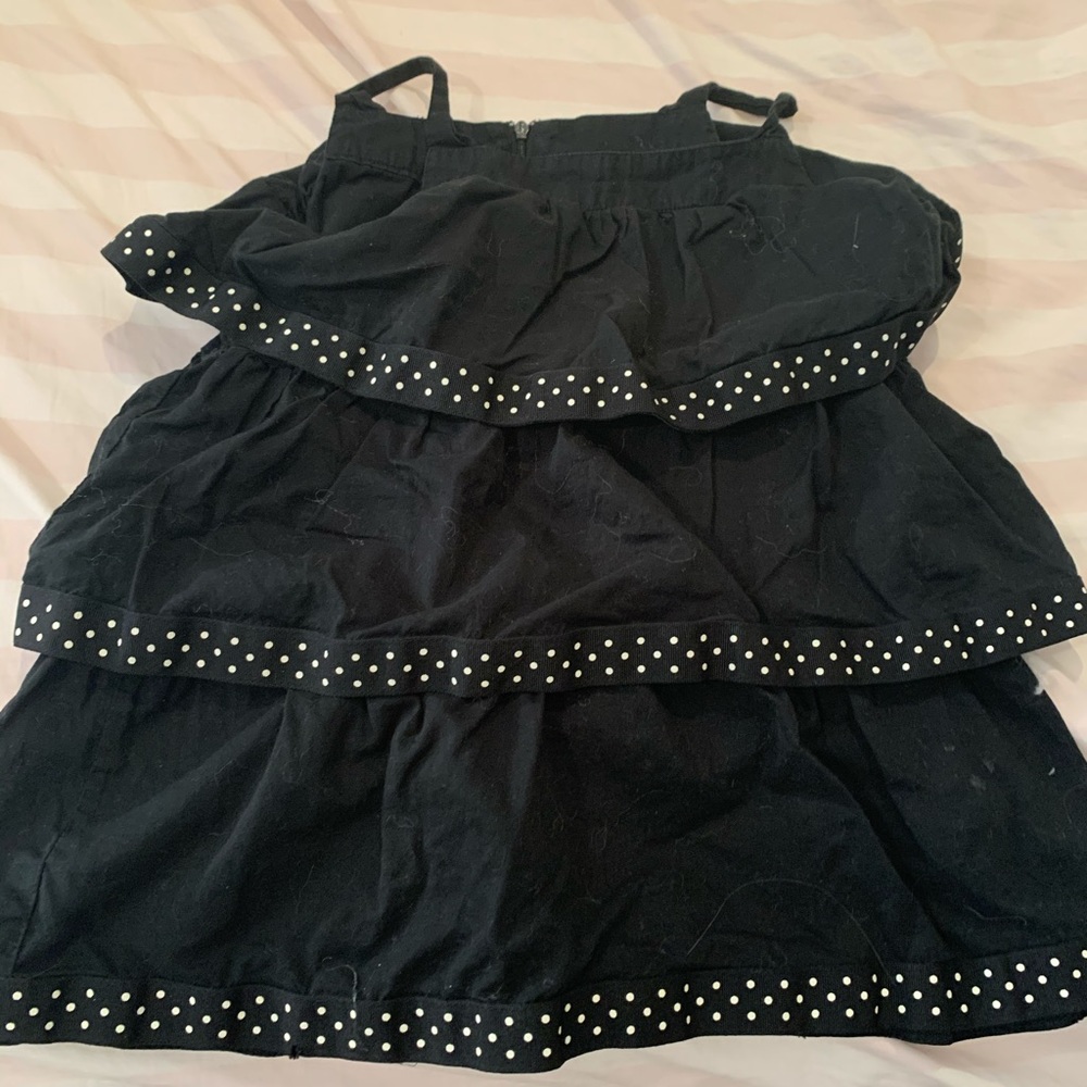 Black and polkadot shirt